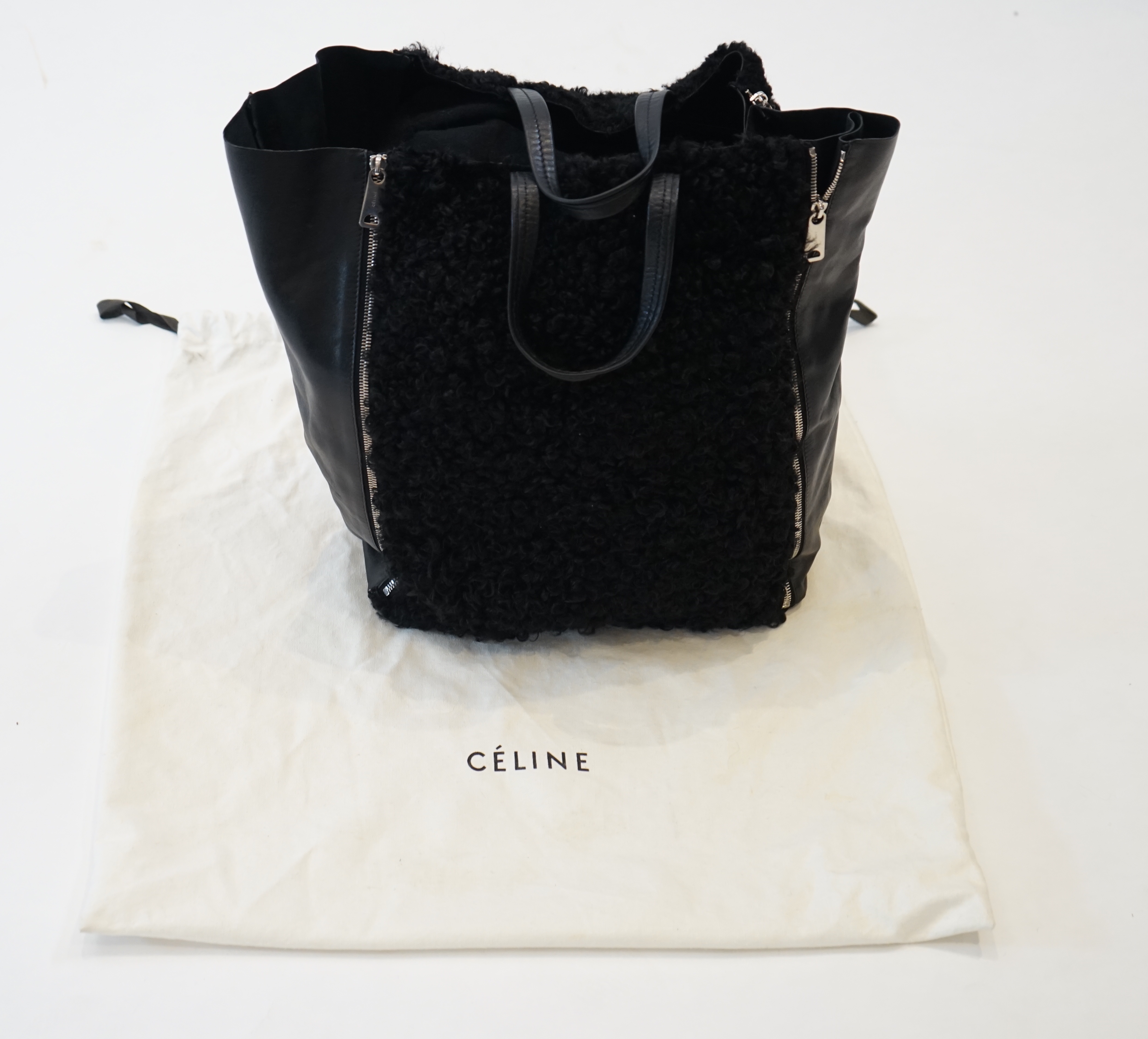 A Celine black shearling and black leather Vertical Gusset Cabas tote bag, Bag width 13cm, length 32cm, height 41cm